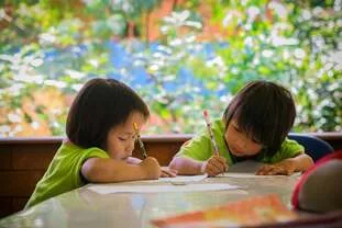 Children studying at Warm Heart after school tutoring