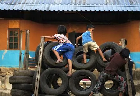 Recycled tires climbing Gym, a favorite of our kids.