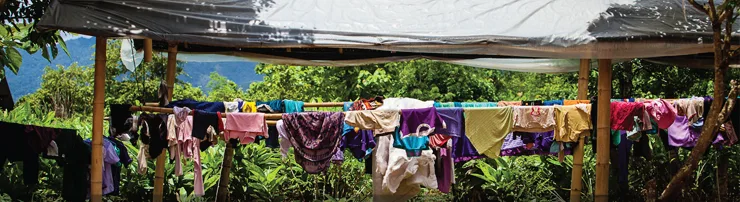 Community clothesline, each child is responsible for their own clothes washing