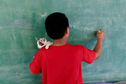 Students receiving educational support and tutoring through Warm Heart's programs