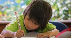 After school tutoring helps hill tribe children catch up and excel in school.