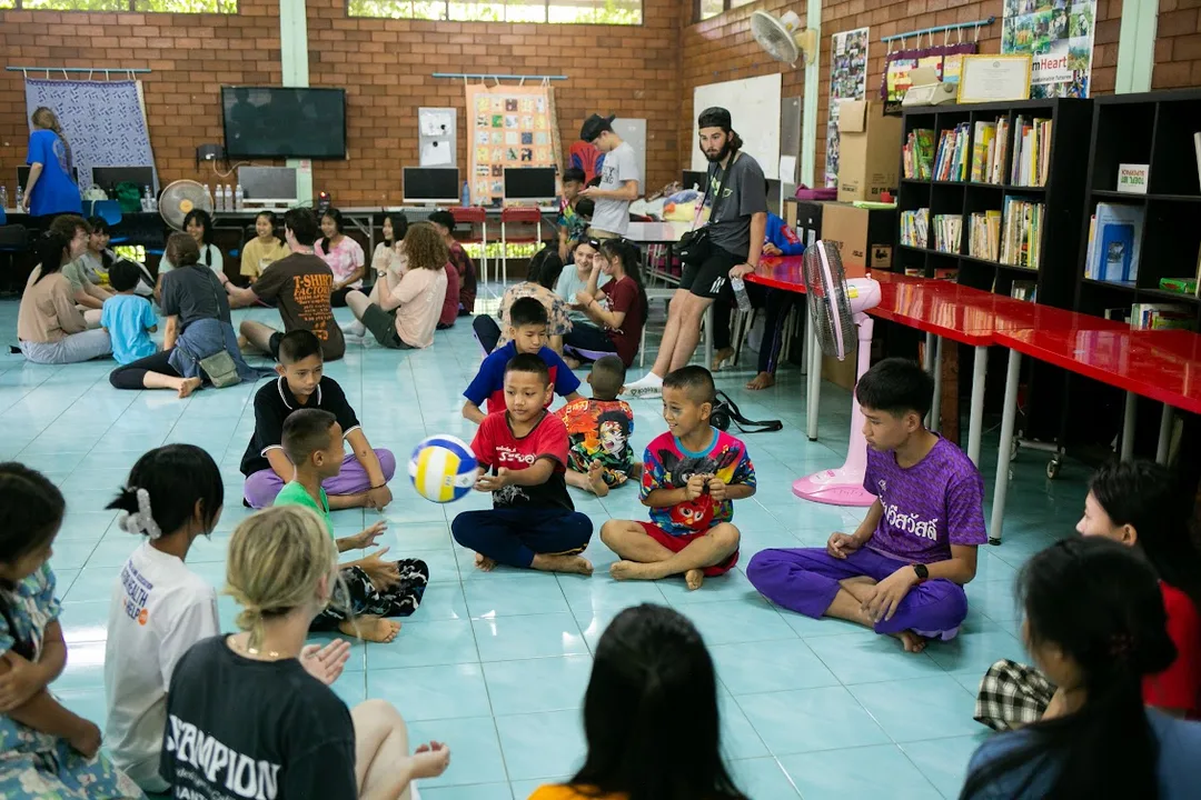 Children participating in class in the library at Barb's Place